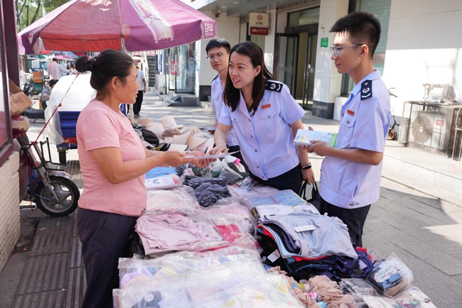 8-13 20240821（发市局内、外网，报省局）古交市税务：税宣进庙会 服务在身边_副本.jpg
